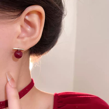 ボルドーボールピアス