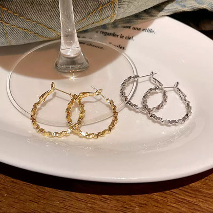 メタリックカットサークルピアス